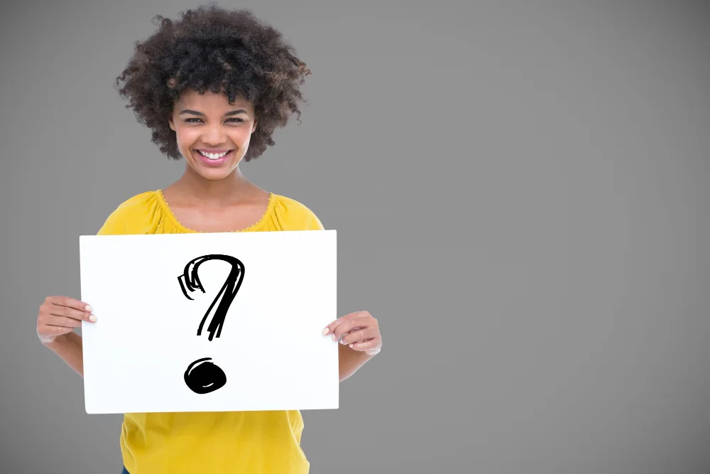Lady holding sign mark